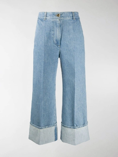 Shop Patou Flared Turn-up Jeans In Blue