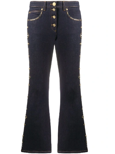 Shop Versace Studded Cropped Flares Trousers In Blue