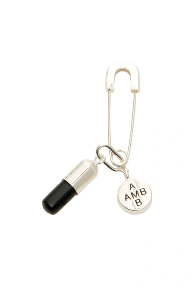 Shop Ambush Pill Charm Piercing Earring In Silver,black