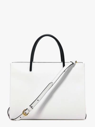 Shop Moschino Handbag In White