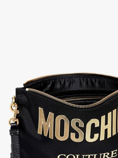 Shop Moschino Clutch In Black