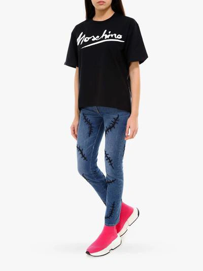 Shop Moschino T-shirt In Black