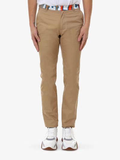 Shop Versace Trousers In Beige