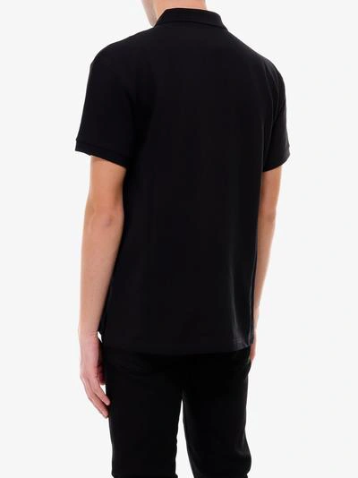 Shop Moschino Polo Shirt In Black
