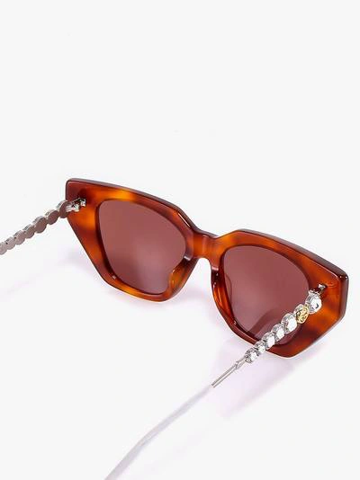 Shop Gucci Sunglasses In Brown