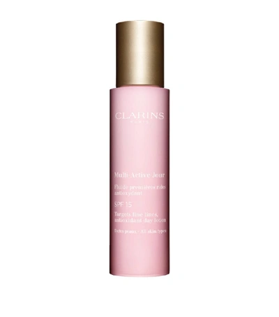 Shop Clarins Multi-active Day Lotion Spf 15 (50ml) In White