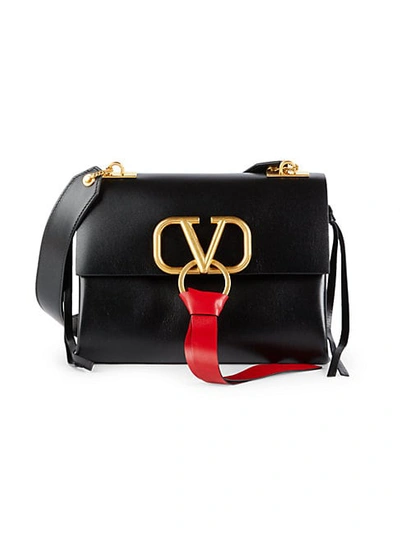 Shop Valentino Leather Tassel Crossbody Bag In Black Red