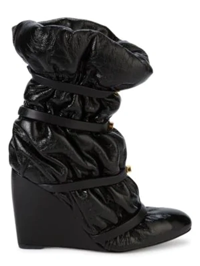 Shop Stuart Weitzman Cinched Patent Leather & Shearling Wedge Boots In Black
