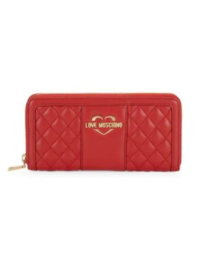 Shop Love Moschino Quilted Zip-around Wallet In Red