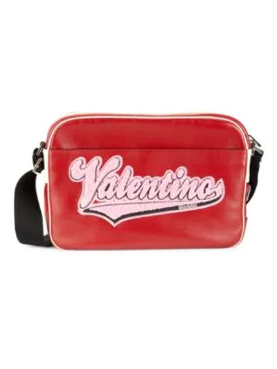 Shop Valentino Leather Logo Messenger Bag In Rosso