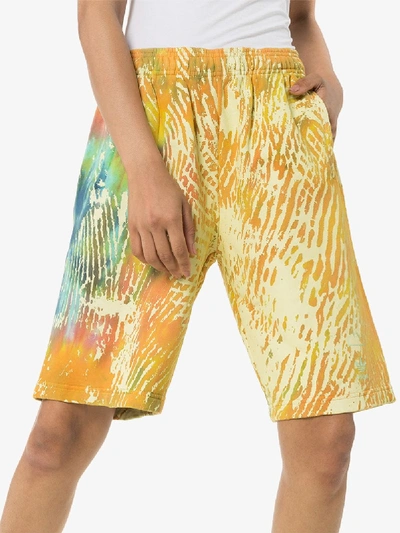 Shop Adidas Originals X Pharrell Williams Tie-dye Cotton Shorts In Yellow