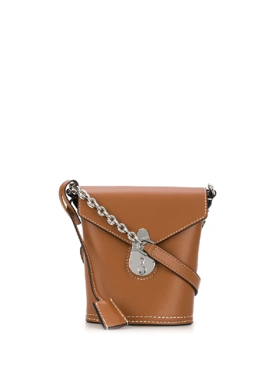 Shop Calvin Klein Foldover Push-lock Bucket Bag In Brown
