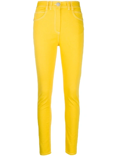 Shop Balmain Contrast-stitching Slim-fit Jeans In Yellow
