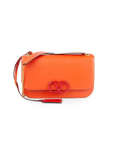 Shop Valentino Logo Leather Flap-top Crossbody Bag In Orange
