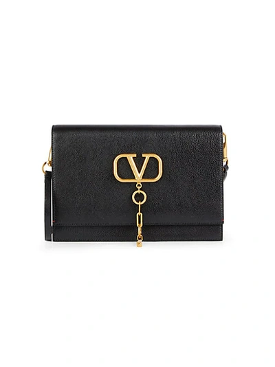 Shop Valentino Logo Pebbled Leather Crossbody Bag In Black