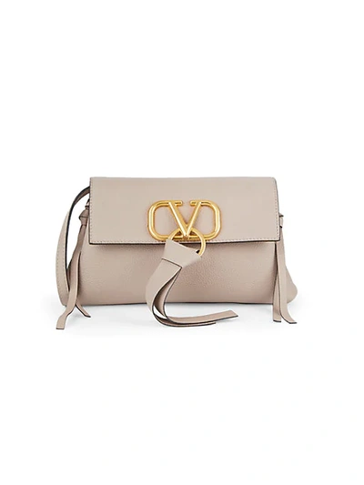 Shop Valentino Logo Pebbled Leather Crossbody Bag In Poudre
