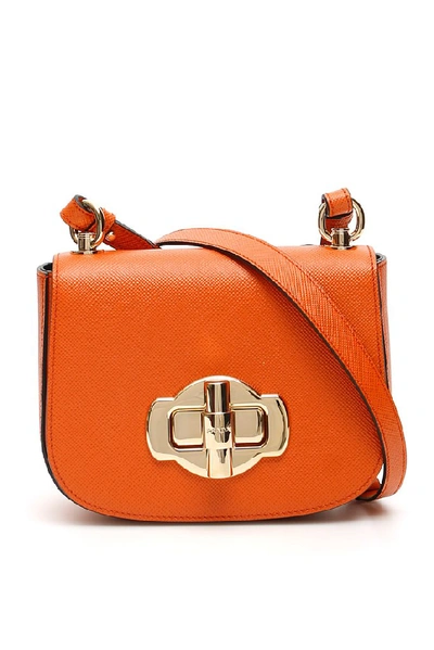 Shop Prada Lock Detail Shoulder Bag In Orange