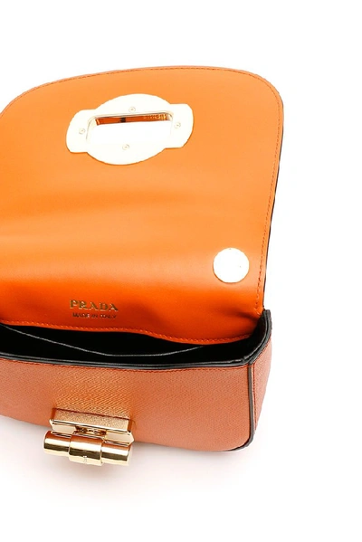 Shop Prada Lock Detail Shoulder Bag In Orange