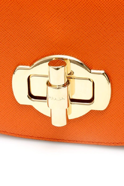 Shop Prada Lock Detail Shoulder Bag In Orange