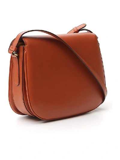 Shop Tod's Logo Buckle Shoulder Bag In Brown