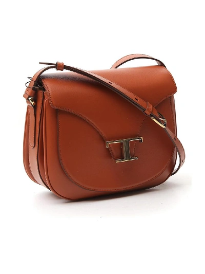 Shop Tod's Logo Buckle Shoulder Bag In Brown