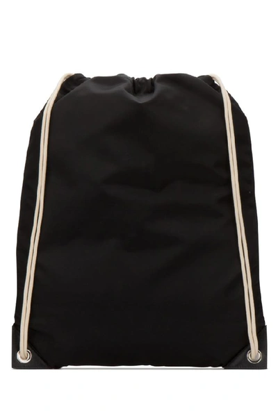 Shop Prada Logo Patch Drawstring Backpack In Black