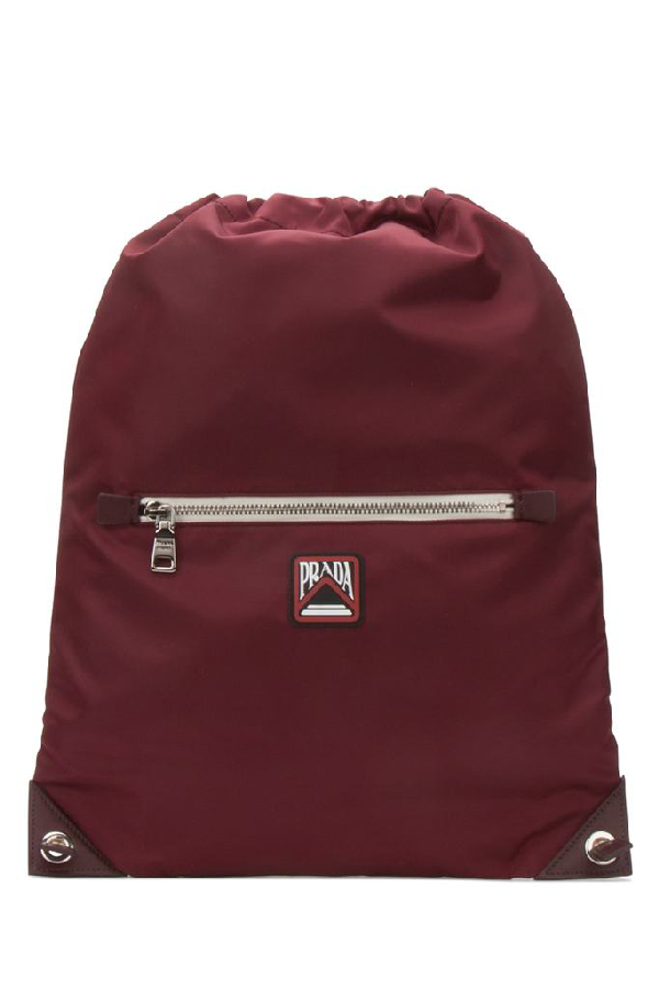 red nylon backpack
