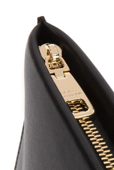 Shop Dolce & Gabbana Embossed Logo Clutch Bag In Black