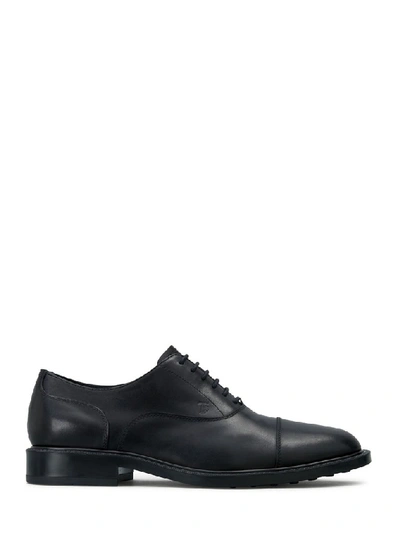 Shop Tod's Lace Up Brogues In Black