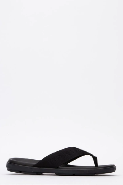 Shop Prada Logo Flip Flop Sandals In Black