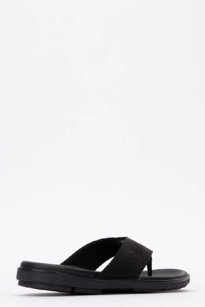 Shop Prada Logo Flip Flop Sandals In Black