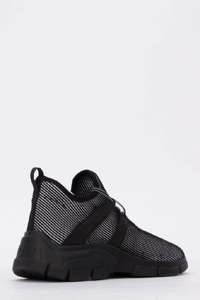 Shop Prada Logo Motif Sock Sneakers In Black