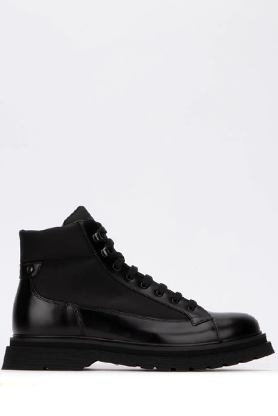 Shop Prada Panelled Combat Boots In Black
