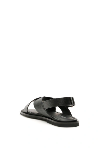 Shop Prada Crossover Logo Sandals In Black