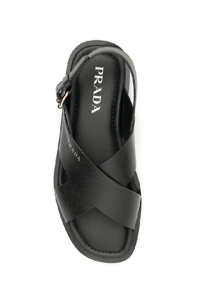 Shop Prada Crossover Logo Sandals In Black