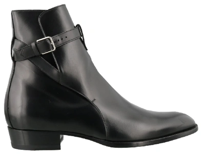 Shop Saint Laurent Wyatt Belted Boots In Black