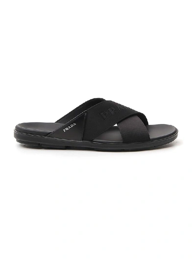 Shop Prada Cross Strap Slides In Black