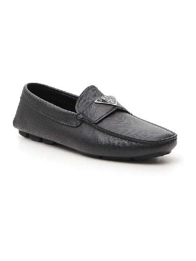 Shop Prada Saffiano Logo Loafers In Black