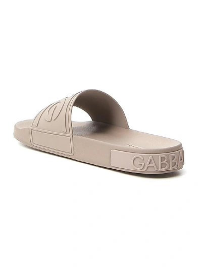 Shop Dolce & Gabbana Logo Embossed Slides In Beige