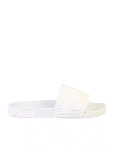 Shop Dolce & Gabbana Logo Embossed Slides In White