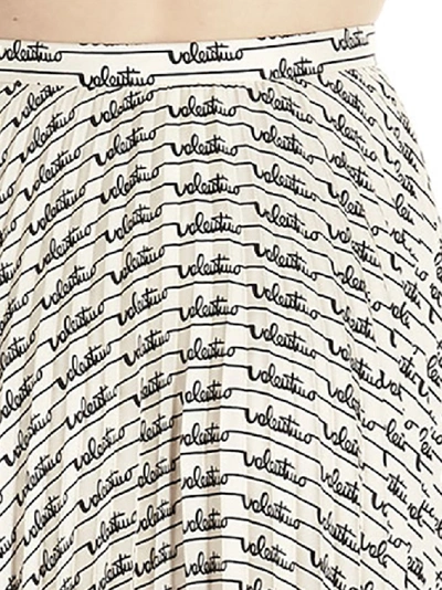Shop Valentino Allover Logo Pleated Midi Skirt In Multi