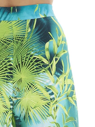 Shop Versace Jungle Print Pants In Multi