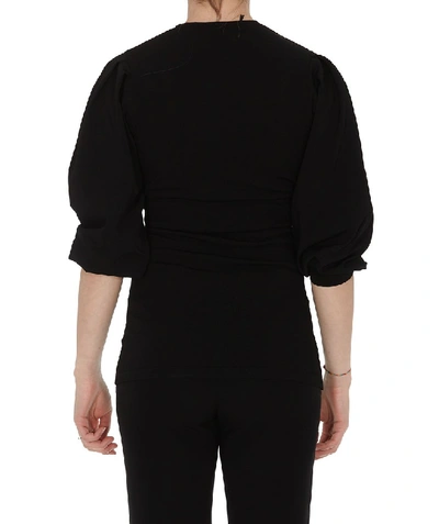 Shop Moschino Buckled Wrap Blouse In Black