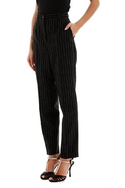 Shop Dolce & Gabbana Pinstripe Tapered Trousers In Black