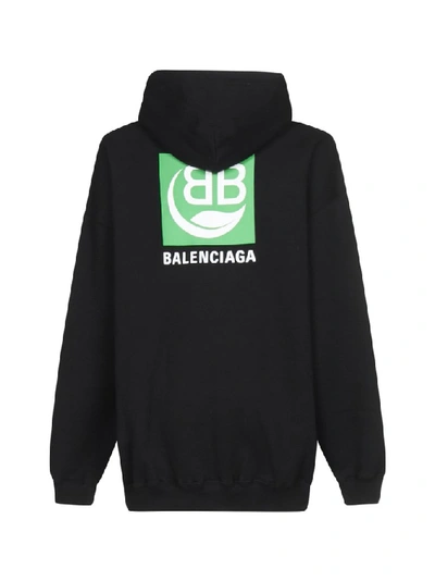 Shop Balenciaga Logo Printed Hoodie In Black