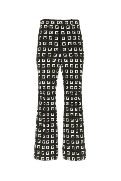 Shop Gucci G Print Flared Pants In Multi