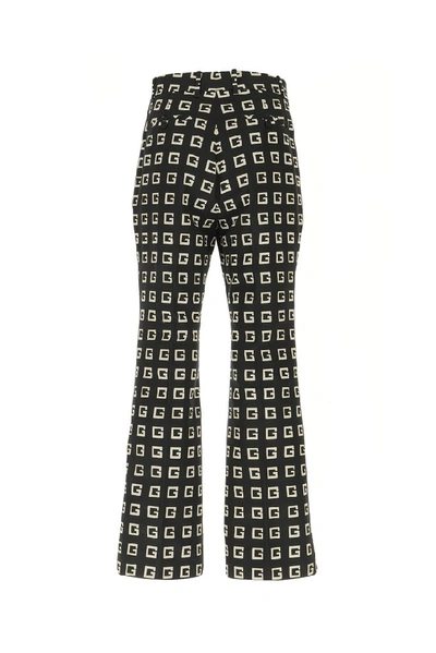 Shop Gucci G Print Flared Pants In Multi