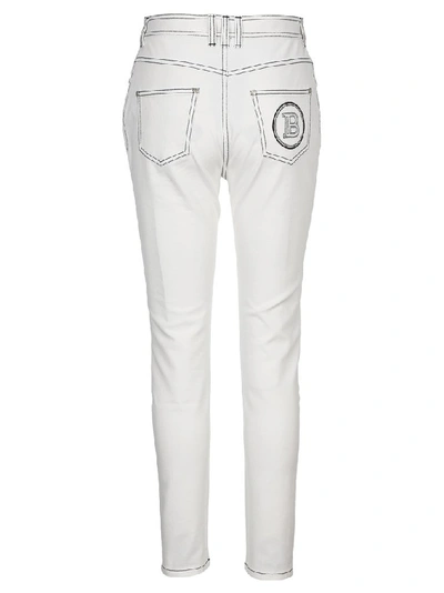 Shop Balmain Skinny Jeans In White