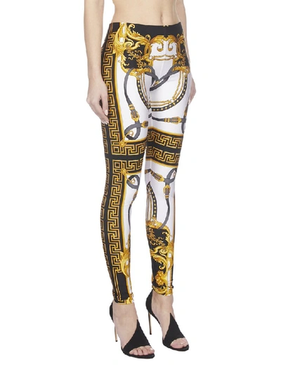 Shop Versace Printed Leggings In Multi