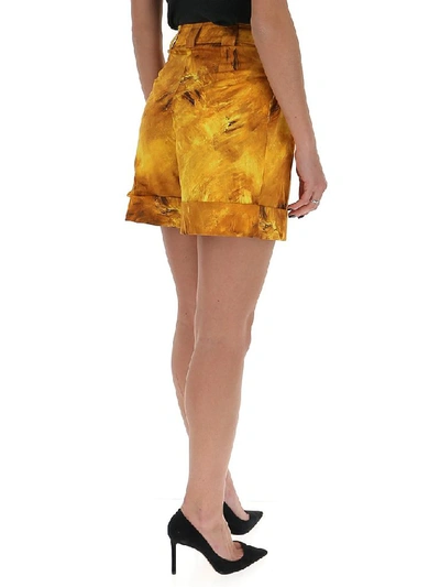 Shop Moschino Printed High Waist Shorts In Yellow